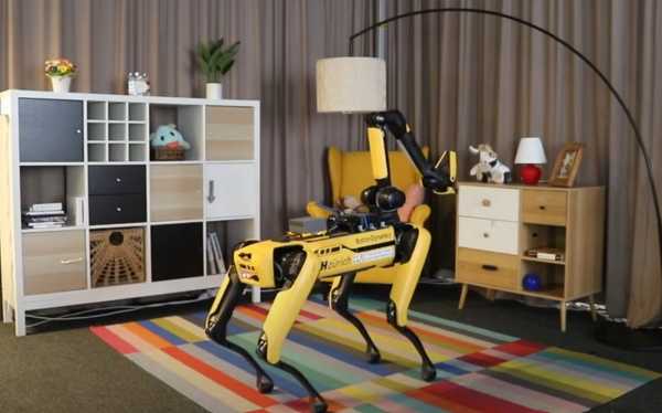 a four legged robot standing in a living room